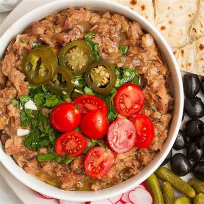  Ful Medames: Een Romige Bonenschotel Vol Met Kruidige Geuren en Lichtpittige Noten!